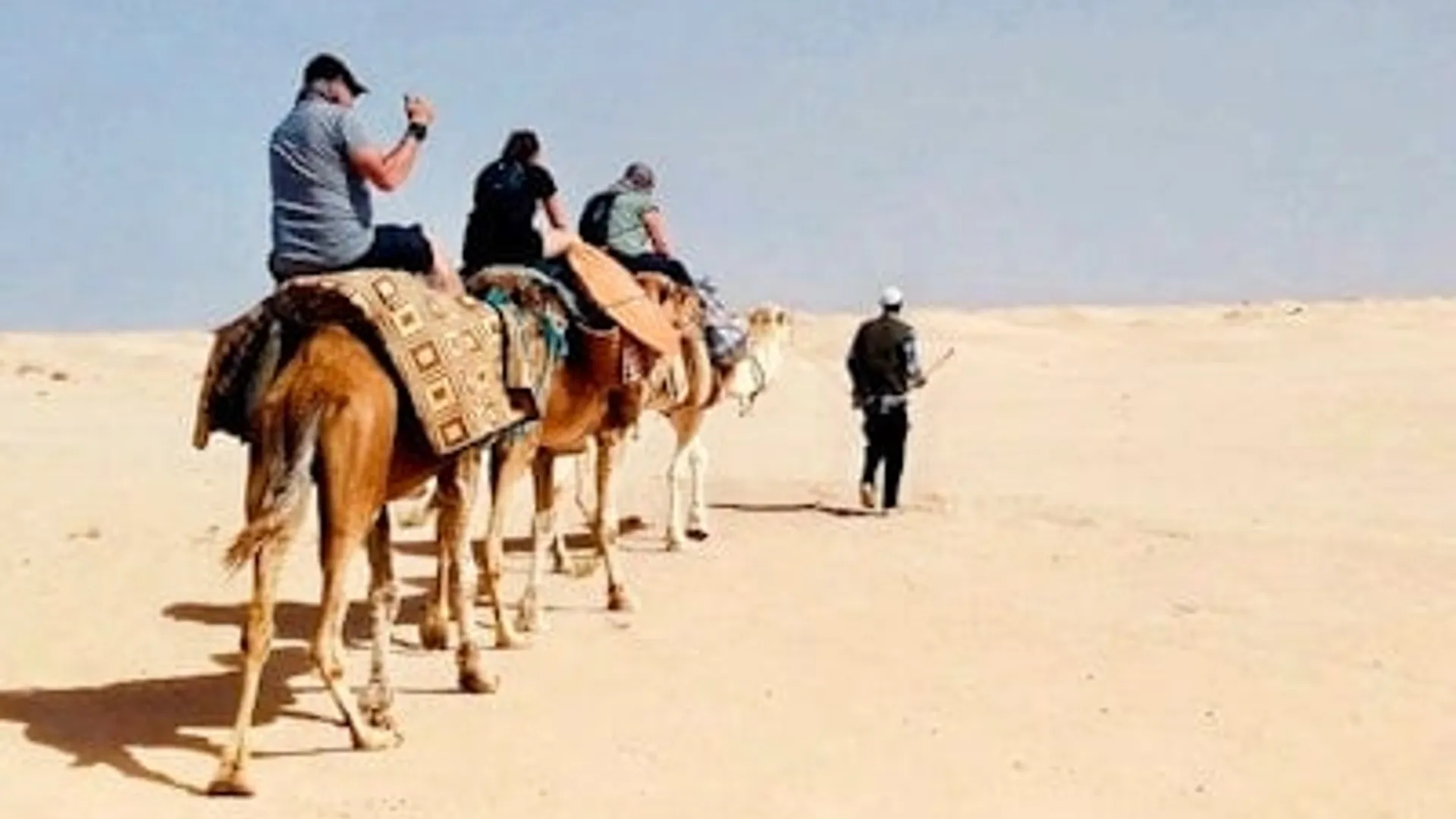 Camel ride in the desert